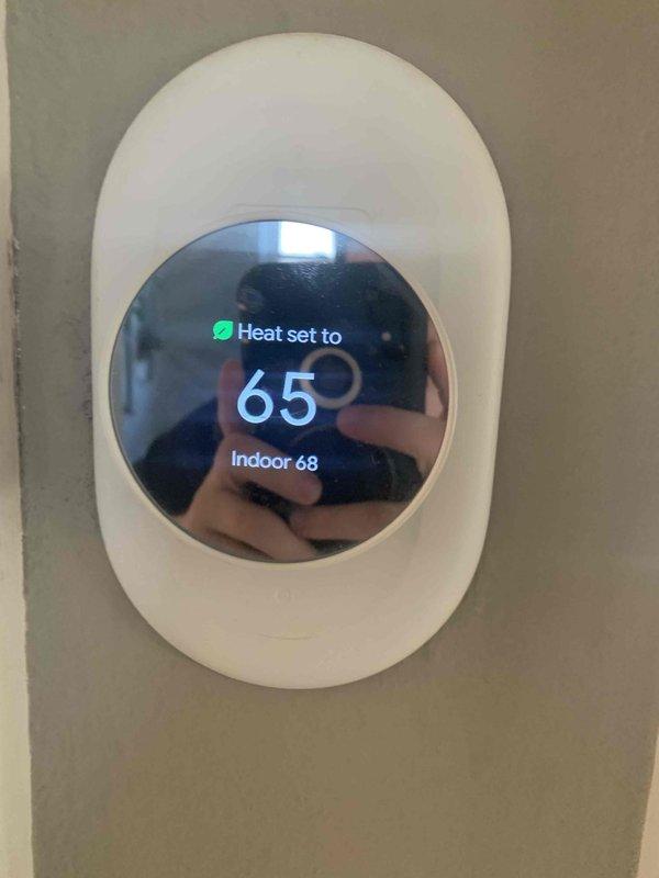 Performed annual heating tune-up on 7-year-old furnace located in basement. Inspected and confirmed proper operation of Nest thermostat and verified heating cycle functionality. Examined furnace unit including PVC exhaust venting, ductwork connections, and all safety systems - all components operating within normal parameters.