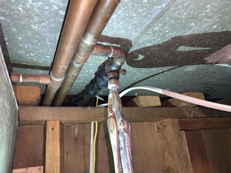 Completed main drain cleanout service to address slow drainage issues caused by root intrusion in the lateral sewer line. Inspection revealed significant corrosion on copper pipes in the basement/crawlspace area, particularly at pipe joints where deterioration was most severe. Successfully cleared blockage and restored proper flow to the system.