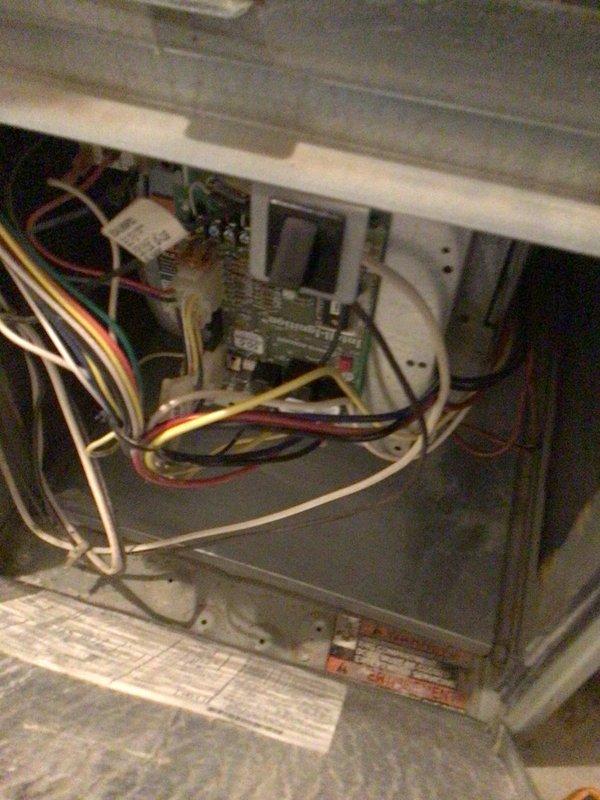 Performed comprehensive cooling tune-up on 2009 air conditioning system. Inspected circuit board connections and internal wiring, finding all components in proper working condition. Verified clean air filter with proper installation; system is operating efficiently with no issues detected.