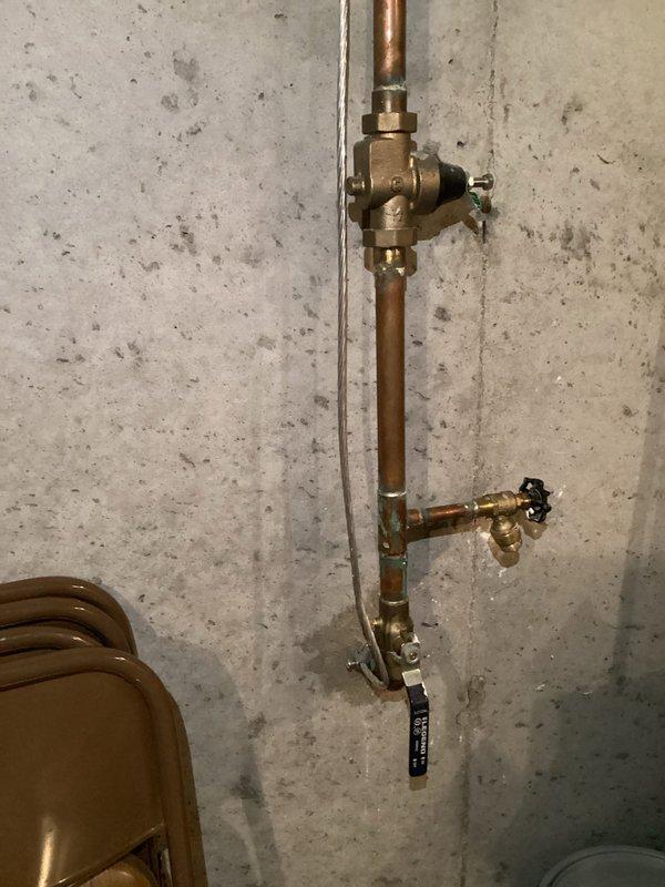 Completed comprehensive electrical home audit including inspection of the 200A main electrical service panel with labeled circuits (including AFCI protected bedroom circuits, range, A/C, and dryer). Visual examination revealed proper organization of the panel with no immediate safety concerns. Also inspected copper plumbing ground connections in utility area as part of the whole-home electrical evaluation.