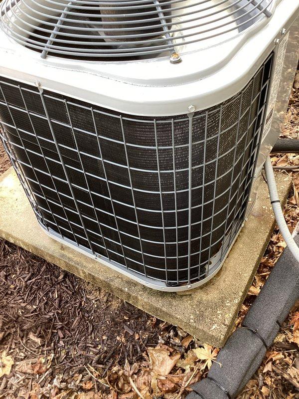 Performed scheduled tune-up service on a 4-year-old outdoor AC condensing unit located on the side of building. Inspected and serviced single unit mounted on concrete pad with proper clearance. Visual inspection showed unit in satisfactory condition with no immediate concerns noted.