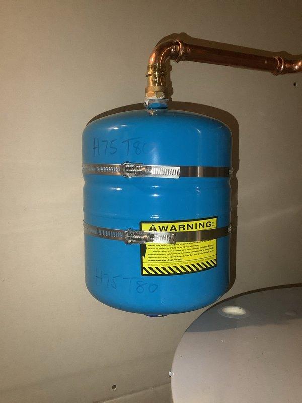 Successfully installed two 50-gallon gas tall water heaters with 1" PRV according to permitted specifications (Permit #26PLU-05178; 26PLU-05179). System includes a properly mounted expansion tank with copper piping connections. Applied required identification stickers to each unit and completed all necessary plumbing connections with appropriate valves per code requirements.