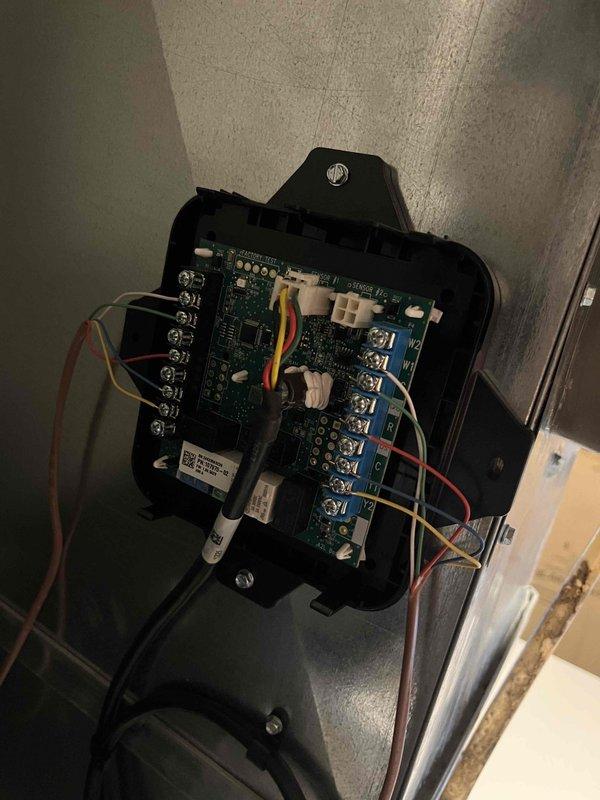 Responded to call back on recently installed unit for electrical control system inspection. Examined exposed control panel, verified proper terminal connections and inspected wiring integrity on primary circuit board. Found and corrected multiple wire connections in junction box, ensuring proper routing of control wires to appropriate terminal blocks.