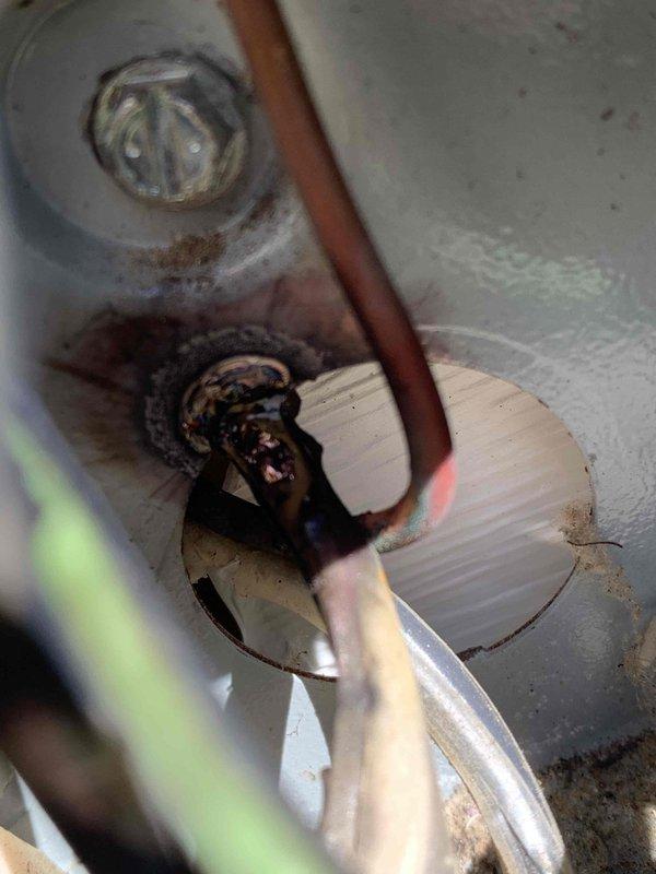 Responded to U10 "No Cool" service call. Upon inspection, found significant corrosion on condensate drain and signs of water damage. Discovered blown fuse (60A FLNR 8, 250V) in electrical panel. Replaced fuse, cleaned drain line, and removed accumulated debris. System restored to proper cooling operation after repairs.