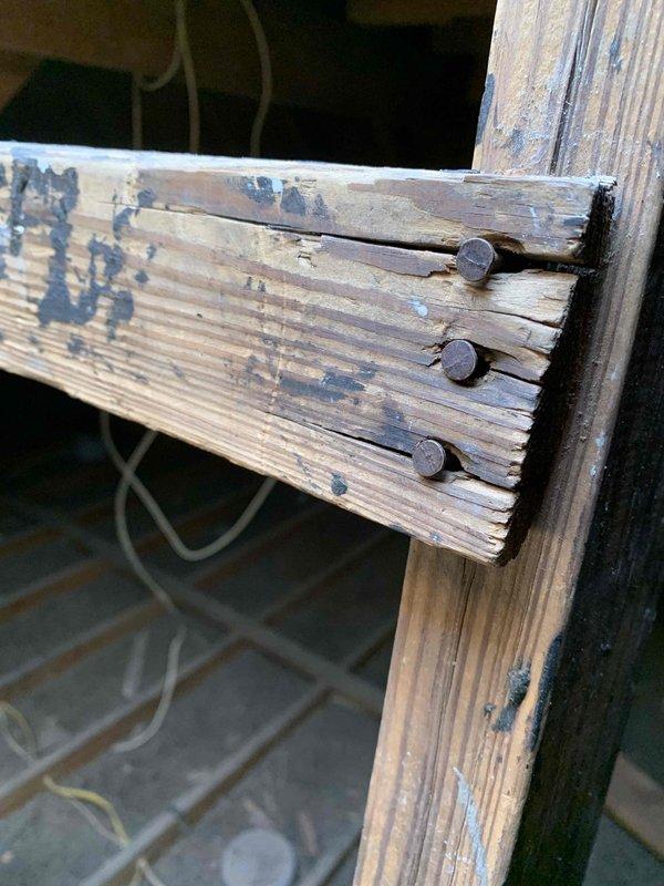 # Service Report: No Cool Call - E183 Error Code

## Summary
Responded to no cool complaint with E183 error code on 10+ year old unit located in back of property; system exhibited short cycling behavior with compressor starting and stopping immediately upon call for cooling.

## Work Performed

Arrived on site and verified customer complaint of no cooling with E183 fault code displayed on thermostat. Unit located in rear of property in crawl space/attic area with difficult access conditions. Upon initial inspection, confirmed compressor was short cycling - energizing briefly then shutting down within seconds of Y1 call.

Accessed unit through confined crawl space area with aged wooden structural supports and limited clearance. Performed diagnostic testing on outdoor condensing unit to isolate cause of E183 error and short cycling condition. Checked electrical connections at compressor contactor, capacitor terminals, and control board connections for loose wiring or degraded contacts.

