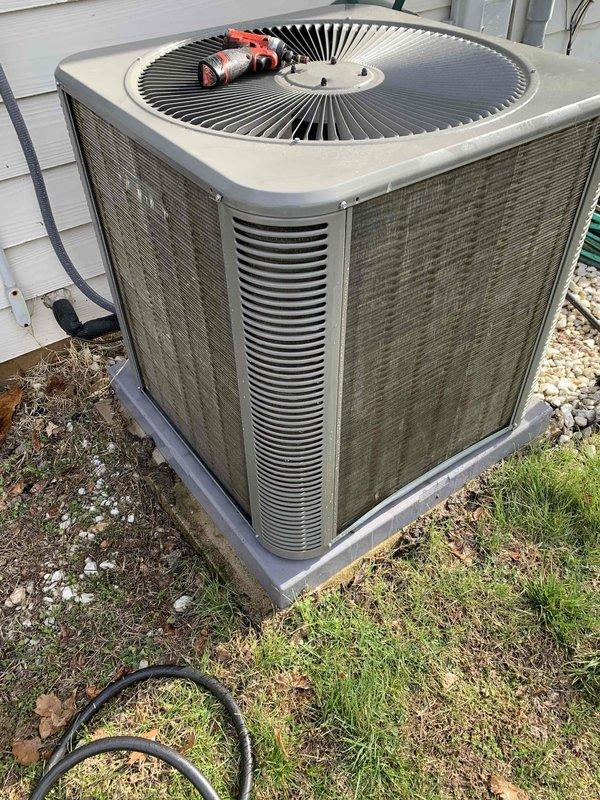 # HVAC Service Report - Cooling System Tune-Up

Performed comprehensive seasonal tune-up and preventive maintenance on 2024 residential air conditioning system. Conducted complete system inspection of outdoor condenser unit, verifying proper operation of compressor, condenser fan motor, and electrical components. Measured and recorded system pressures and temperatures to ensure refrigerant charge within manufacturer specifications.

Inspected condenser coil condition through louvers, checking for debris accumulation and airflow restrictions. Verified proper clearances around outdoor unit for adequate ventilation. Examined electrical connections, contactors, and capacitor for signs of wear or degradation. Tested compressor amperage draw and compared against nameplate specifications to assess mechanical condition.

Evaluated indoor air handler components, including blower motor operation and filter condition. Documented existing filter media with standard pleated design in proper mountin