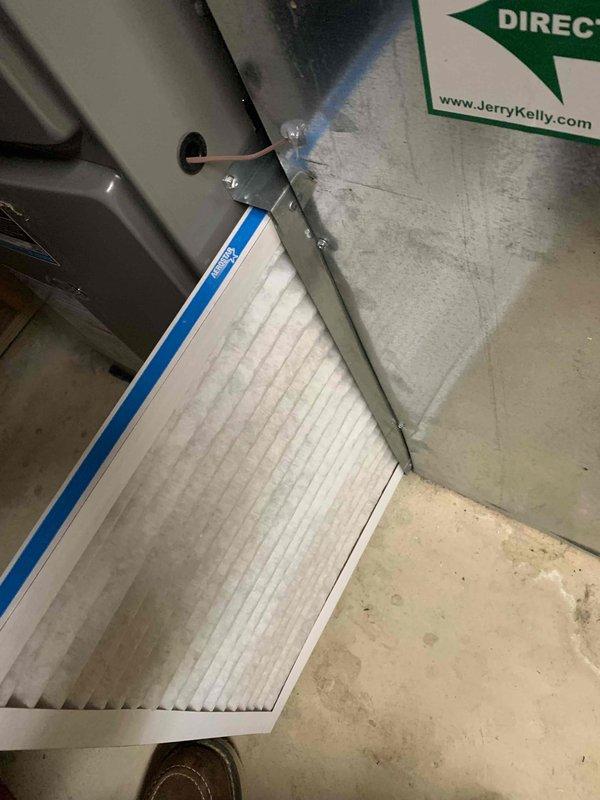 # HVAC Service Report - Cooling System Tune-Up

Performed comprehensive seasonal tune-up and preventive maintenance on 2024 residential air conditioning system. Conducted complete system inspection of outdoor condenser unit, verifying proper operation of compressor, condenser fan motor, and electrical components. Measured and recorded system pressures and temperatures to ensure refrigerant charge within manufacturer specifications.

Inspected condenser coil condition through louvers, checking for debris accumulation and airflow restrictions. Verified proper clearances around outdoor unit for adequate ventilation. Examined electrical connections, contactors, and capacitor for signs of wear or degradation. Tested compressor amperage draw and compared against nameplate specifications to assess mechanical condition.

Evaluated indoor air handler components, including blower motor operation and filter condition. Documented existing filter media with standard pleated design in proper mountin