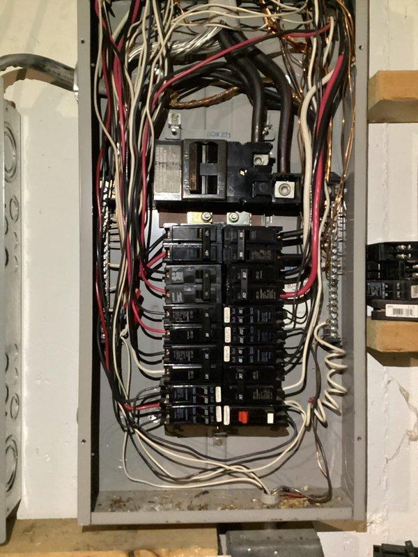 # Electrical Maintenance - Home Audit Summary

Completed comprehensive electrical inspection of residential service panels and distribution system. Documented existing electrical infrastructure including main panel configuration with dual-row circuit breaker arrangement and secondary Challenger-brand panel installation. Assessed wire management, bus bar connections, and overall system integrity. Photographed panel interiors showing wire routing, breaker distribution, and termination points for service records. Verified proper panel accessibility and documented current system configuration for homeowner reference.