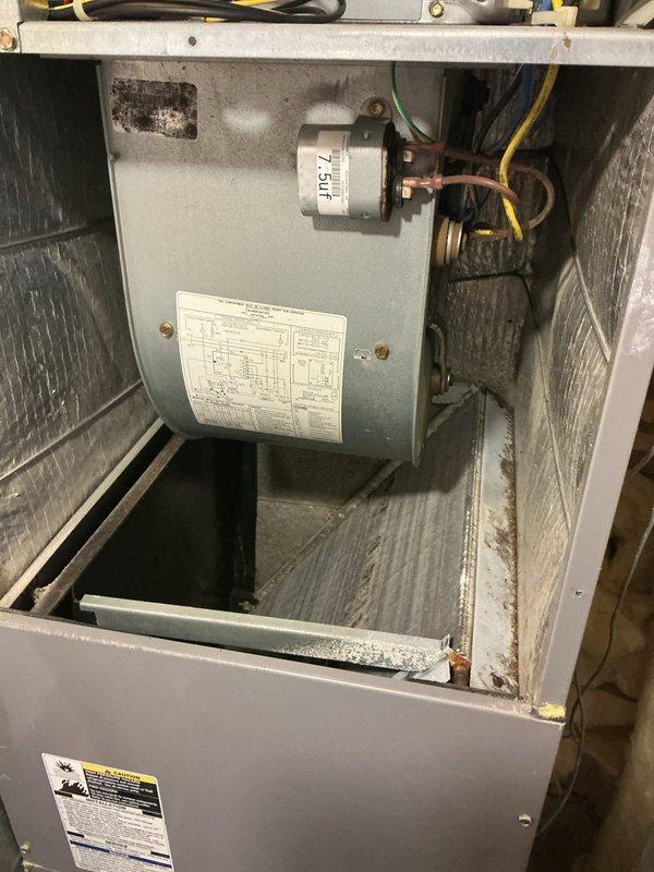 # HVAC Service Report - No Cooling

Responded to service call for outdoor condenser fan not operating. Upon arrival, inspected outdoor unit and confirmed fan motor failure preventing proper heat rejection from refrigeration system. Accessed air handler interior components and verified capacitor specifications at 7.5uf. Replaced failed condenser fan motor and tested system operation. Unit restored to proper cooling function with outdoor fan running at correct speed and condenser operating within normal parameters.