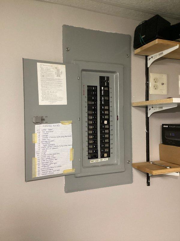 # Electrical Maintenance - Home Audit Summary

Performed complimentary electrical system inspection as part of membership benefits program. Conducted comprehensive evaluation of main electrical panel, verifying proper breaker operation, wire connections, and circuit labeling integrity. Documented panel configuration with detailed photography showing dual-column breaker arrangement with approximately 20-24 circuits, color-coded wiring (including phase conductors, neutrals, and grounding), and existing circuit directory posted on panel door.

Inspection revealed generally organized wiring with proper bundling of neutral and hot conductors throughout the enclosure. Verified all breaker connections were secure and panel components showed no visible signs of overheating, corrosion, or damage. Noted handwritten circuit notes posted adjacent to panel for homeowner reference. All findings documented photographically for service records, with no immediate safety concerns or code violations iden