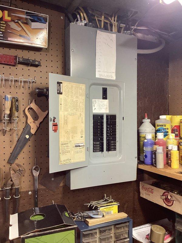 # Electrical Maintenance - Home Audit Summary

Completed complimentary electrical safety inspection for member. Conducted comprehensive assessment of main electrical panel located in workshop area and exterior utility meter installation. Panel inspection revealed properly organized circuit breaker configuration with clear labeling and appropriate wire management at service entrance. Verified exterior meter enclosure integrity, conduit connections, and grounding system compliance. All components found to be in serviceable condition with no immediate safety concerns identified. Documented system configuration with photographs for member records.