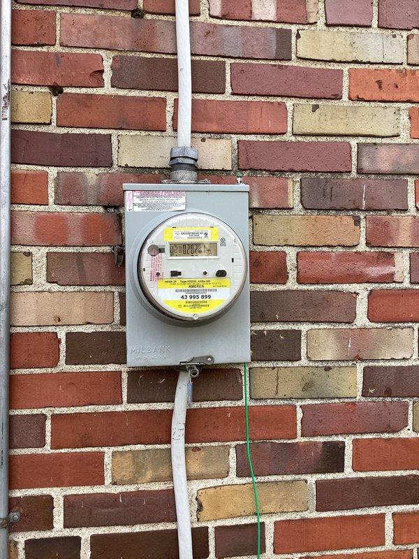 # Electrical Maintenance - Home Audit Summary

Completed complimentary electrical safety inspection for member. Conducted comprehensive assessment of main electrical panel located in workshop area and exterior utility meter installation. Panel inspection revealed properly organized circuit breaker configuration with clear labeling and appropriate wire management at service entrance. Verified exterior meter enclosure integrity, conduit connections, and grounding system compliance. All components found to be in serviceable condition with no immediate safety concerns identified. Documented system configuration with photographs for member records.