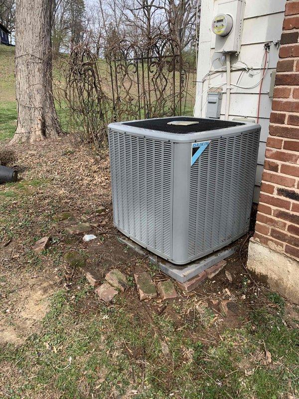 # Service Report: HVAC Tune-Up U10 - Cooling

## Summary
Responded to service call for air conditioning unit not producing cool air. Performed comprehensive cooling system tune-up and diagnostic evaluation on outdoor condensing unit located on side of residence.

## Work Performed

**System Inspection:**
Conducted visual inspection of outdoor condensing unit and accessed electrical control panel for diagnostic assessment. Unit showed signs of age with previous service history noted by handwritten markings inside control compartment indicating prior capacitor replacement (10 µF notation visible).

**Electrical Component Evaluation:**
Opened and inspected electrical control panel revealing multiple wire connections to contactor, control board, and associated circuits. Evaluated condition of wiring harnesses, contactor operation, and control module functionality. Assessed electrical connections for proper termination and signs of heat damage or deterioration.

**Cooling System Diagnostics