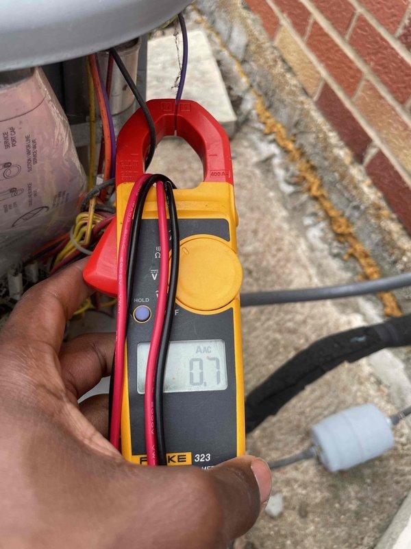 # Service Report: AC Tune-Up Completed

Performed comprehensive cooling system tune-up on 2015 AC unit located at ground level on side of home. Conducted standard preventive maintenance protocol including system diagnostics, thermostat verification at 72°F setpoint, and electrical current measurements using clamp meter to verify proper compressor amperage draw. All components inspected and found operating within normal parameters; system tested and confirmed cooling efficiently with no issues identified.