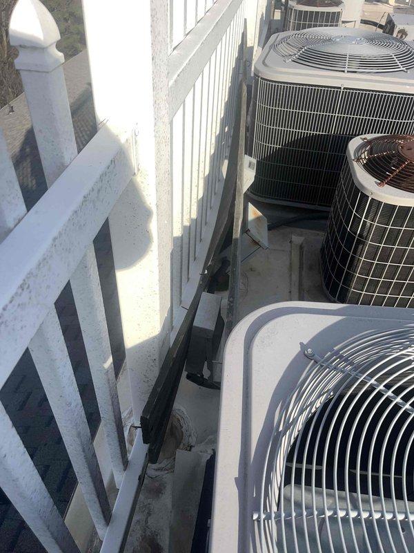 Performed diagnostic evaluation on rooftop HVAC system consisting of multiple air conditioning condenser units following reported low refrigerant concern. Conducted comprehensive inspection of all accessible equipment, including visual assessment of refrigerant line connections, condenser coils, and overall unit condition. Documented equipment configuration and current operating status with photographic evidence for service records.