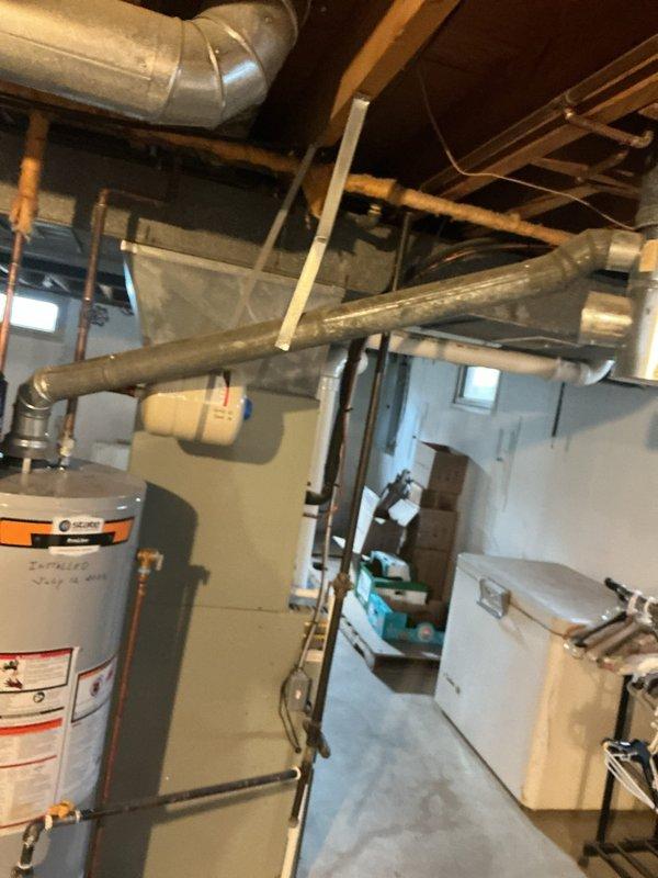 Responded to no cooling complaint on residential split system air conditioning unit over 10 years old located on side of home. Upon arrival, confirmed system was running but not producing cold air. Performed diagnostic evaluation of furnace/air handler and outdoor condensing unit. Identified failed compressor preventing refrigerant circulation through system. Discussed repair options and recommended compressor replacement. Customer approved necessary repairs to restore cooling operation to the system.