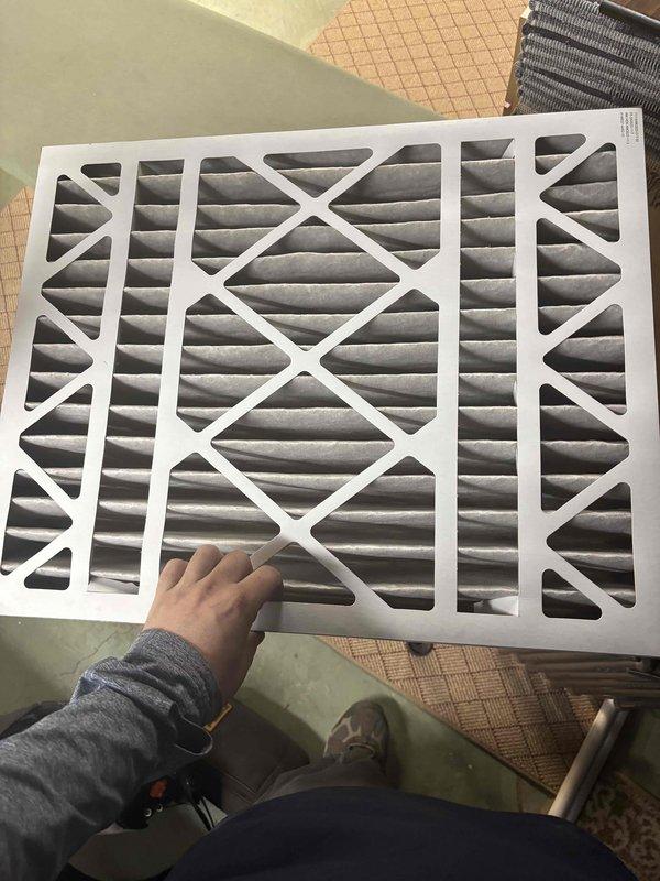 Completed comprehensive cooling system tune-up on 11-year-old residential air conditioning unit located at side of home. Performed standard maintenance protocol including filter inspection and replacement of heavily soiled pleated air filter, internal control board examination, and electrical connection verification. All system components operational and unit running within normal parameters upon completion.