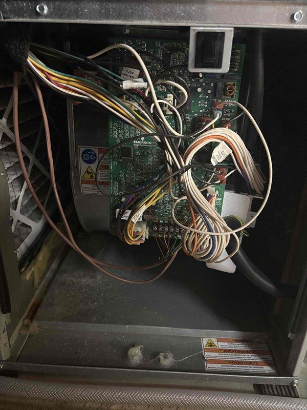 Completed comprehensive cooling system tune-up on 11-year-old residential air conditioning unit located at side of home. Performed standard maintenance protocol including filter inspection and replacement of heavily soiled pleated air filter, internal control board examination, and electrical connection verification. All system components operational and unit running within normal parameters upon completion.