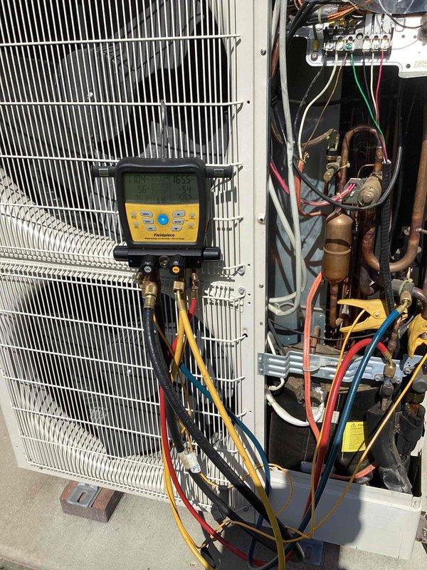 Responded to service call for frozen evaporator coil on 6-year-old mini-split system serving south side of residence. Connected manifold gauge set to outdoor condenser unit to measure refrigerant pressures and system performance parameters. Upon inspection of indoor air handler unit, assessed internal components including blower assembly, refrigerant lines, electrical connections, and evaporator coil condition to diagnose cause of freezing issue.