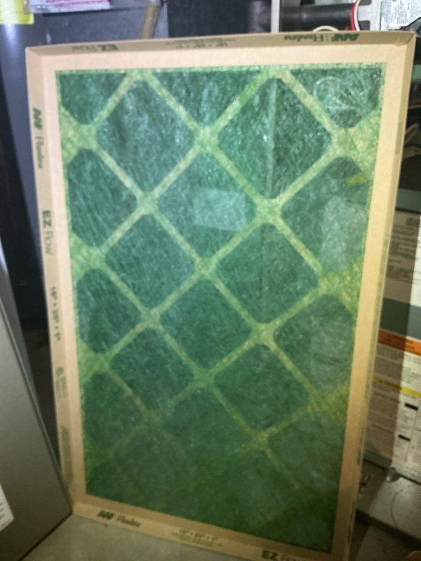 Responded to no cooling complaint on single outdoor unit. Upon arrival, found system blowing warm air. Performed diagnostic inspection of air handler and control components. Inspected electrical connections, control board, blower off delay circuit, and capacitor - all found in functional condition with normal operational wear. Examined air filter which showed significant dust and debris accumulation restricting airflow. Replaced dirty filter with new unit to restore proper system airflow and cooling efficiency. Verified all electrical connections secure and control board operating within parameters. System restored to normal cooling operation.