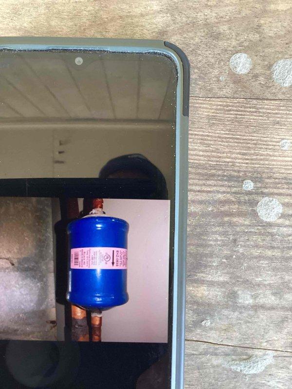 Responded to no cooling call on rooftop unit 10. Upon inspection, diagnosed failed filter dryer in refrigeration circuit. Replaced defective filter dryer component, evacuated system, and recharged with proper refrigerant quantity. Verified system operation with normal cooling restored and all parameters within manufacturer specifications.