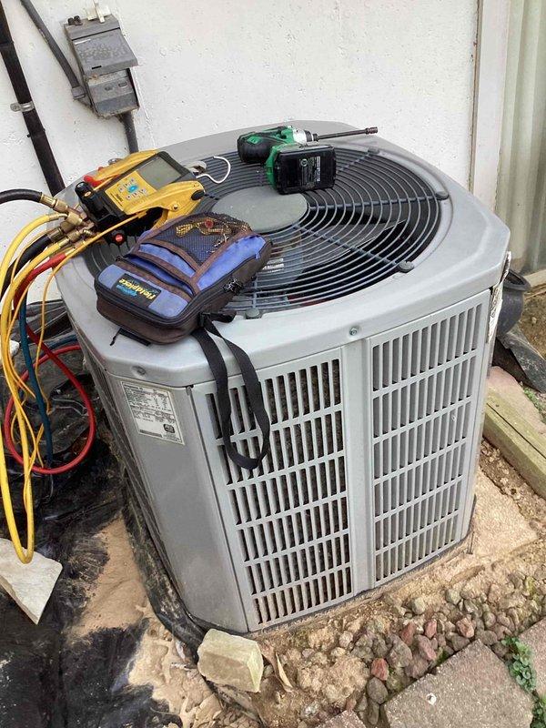 Responded to service call for air conditioning system blowing warm air. Upon arrival, performed diagnostic evaluation of 10-year-old outdoor condenser unit located on side of residence. Connected manifold gauges to measure refrigerant pressures and temperatures, identifying system operating parameters. Inspected indoor furnace and air handler components in basement mechanical room to verify proper airflow and equipment operation. Completed system assessment and provided findings to address warm air complaint.