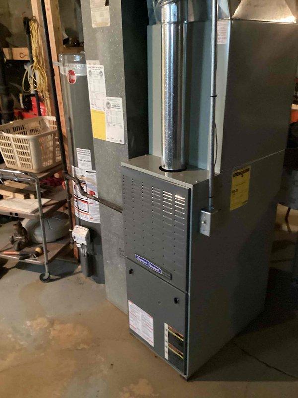 Responded to service call for air conditioning system blowing warm air. Upon arrival, performed diagnostic evaluation of 10-year-old outdoor condenser unit located on side of residence. Connected manifold gauges to measure refrigerant pressures and temperatures, identifying system operating parameters. Inspected indoor furnace and air handler components in basement mechanical room to verify proper airflow and equipment operation. Completed system assessment and provided findings to address warm air complaint.