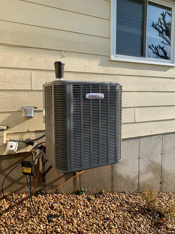 Completed seasonal cooling tune-up on 10-year-old Lennox condenser unit located on side of house. Performed comprehensive system inspection including electrical connections at disconnect box, refrigerant levels, condenser coil cleaning, and operational testing of all components. Membership renewal processed on-site per customer request.
