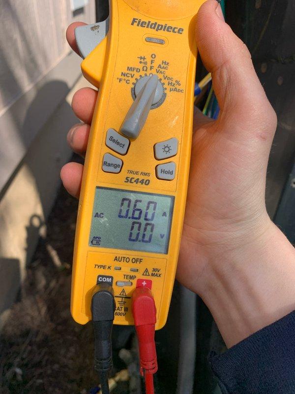 Completed cooling maintenance tune-up on 9-year-old Trane air conditioning system. Performed standard diagnostic testing using digital multimeter to verify electrical components and capacitor readings, which measured at 0.60 MFD. Inspected air filtration system and confirmed filter requires replacement by customer as previously noted.