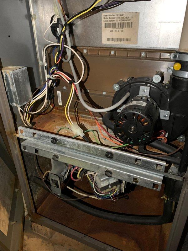 Completed preventive maintenance tune-up on a residential cooling system over 10 years old located in the side yard. Performed comprehensive inspection of the air handler blower assembly, verified proper motor operation and electrical connections, and checked ductwork system for proper airflow and secure fastening. All components found operating within normal parameters with no immediate repairs required at this time.