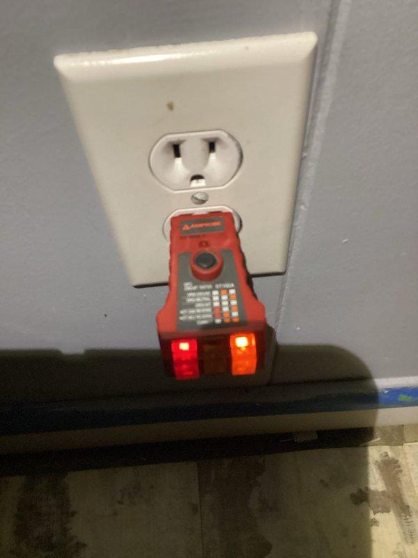 Responded to service call for non-operational bathroom ceiling fan/ventilation unit and open ground electrical outlet in basement. Performed diagnostic testing on basement outlet using digital circuit analyzer, which confirmed open ground condition indicating missing or disconnected ground wire. Inspected upstairs bathroom exhaust fan combination unit with integrated lighting; verified light fixture operational but fan motor inoperative. Tested electrical connections at fan housing, identified failed motor assembly requiring replacement. Provided recommendations for correcting open ground safety hazard and replacing bathroom ventilation fan motor to restore full functionality.