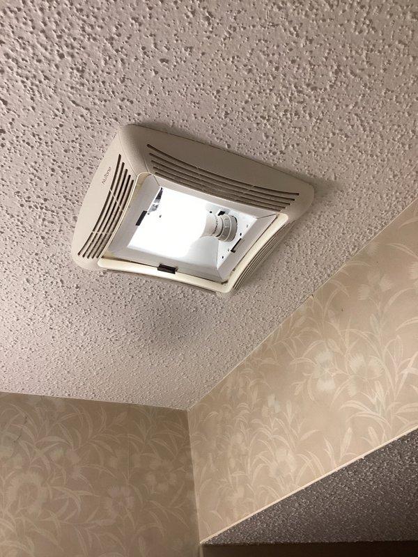 Responded to service call for non-operational bathroom ceiling fan/ventilation unit and open ground electrical outlet in basement. Performed diagnostic testing on basement outlet using digital circuit analyzer, which confirmed open ground condition indicating missing or disconnected ground wire. Inspected upstairs bathroom exhaust fan combination unit with integrated lighting; verified light fixture operational but fan motor inoperative. Tested electrical connections at fan housing, identified failed motor assembly requiring replacement. Provided recommendations for correcting open ground safety hazard and replacing bathroom ventilation fan motor to restore full functionality.