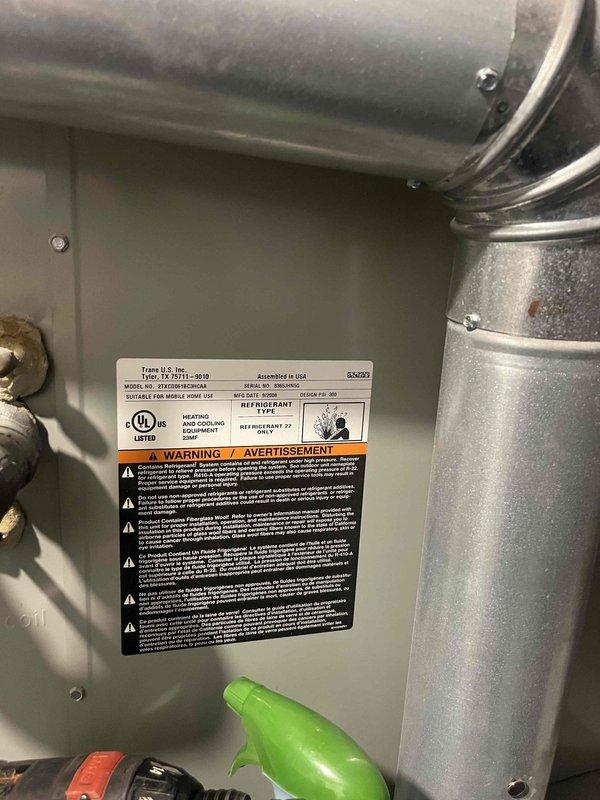 Performed comprehensive cooling tune-up on 17-year-old Trane air conditioning system located at side of home. Completed full system inspection, checked refrigerant levels, inspected condenser coil, tested electrical connections, and verified proper airflow. Replaced air filter and documented equipment condition with photos for customer records.