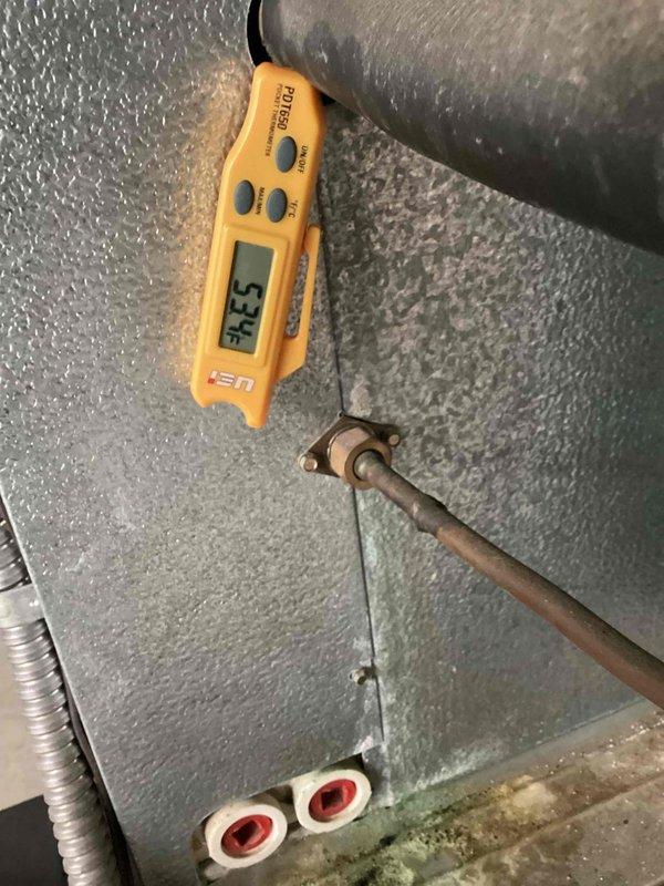 Responded to no cooling complaint on 10+ year old system with reported vibration. Performed diagnostic evaluation and temperature measurements at indoor evaporator coil, recording 57.5°F reading. Conducted electrical amperage testing at outdoor condensing unit using clamp meter, measuring 0.130 amps at compressor circuit. Identified system operational issues requiring repair recommendations. Discussed preventive maintenance agreement options with first-time customer for ongoing system protection.