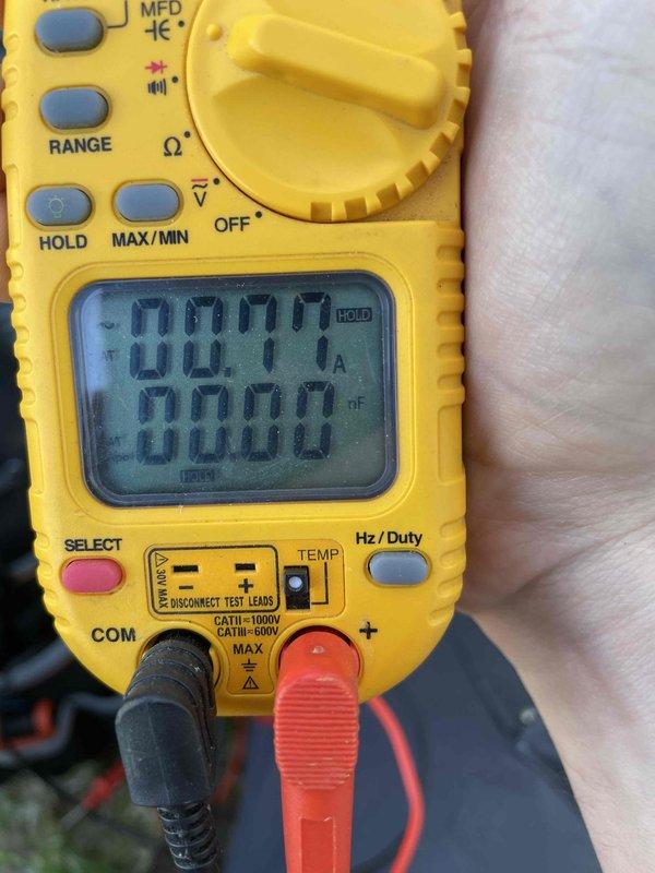 Completed standard U10 cooling tune-up on residential split system air conditioning unit under ten years old. Performed comprehensive system diagnostics including capacitor testing with digital multimeter and visual inspection of outdoor condenser unit components. All measurements within manufacturer specifications; system operating properly with no deficiencies noted.