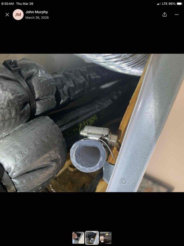 Responded to callback for malfunctioning mini-split system. Upon arrival, conducted thorough inspection of indoor air handler unit and associated components in attic space. Documented extensive moisture accumulation on refrigerant line insulation and condensate drainage system. Photographed damaged flex ductwork showing deterioration and discoloration, along with condensate drain line configuration including PVC elbow fitting. Inspected air handler cabinet and verified moisture issues affecting system operation. Completed comprehensive photo documentation of all damaged components and system conditions as requested, including close-up views of affected refrigerant lines, drain connections, and ductwork. Notified management of findings and provided visual evidence for warranty claim processing and further corrective action planning.