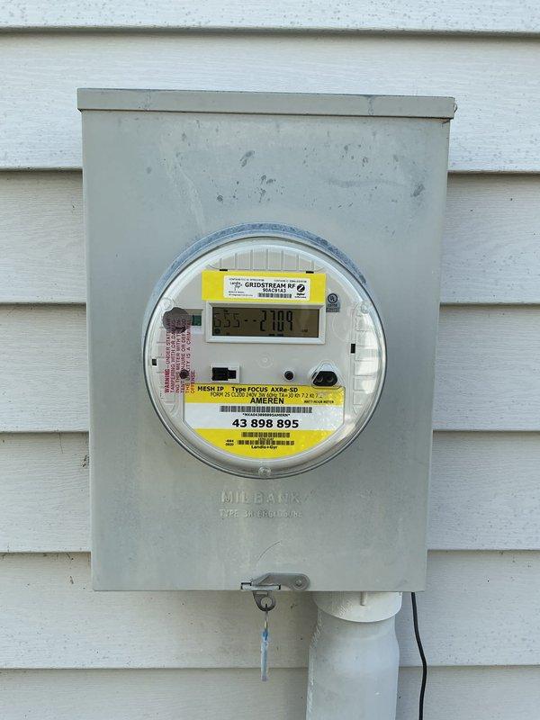 Completed comprehensive electrical inspection of residential property. Evaluated exterior utility meter installation, confirming proper mounting of Ameren Gridstream RF meter in Milbank Type 1R enclosure with secure conduit connections and appropriate weatherproofing. Inspected main electrical panel, verifying circuit breaker configuration, wire routing integrity, proper conductor sizing, and secure terminations at main bus bars, with all components functioning within normal operating parameters.