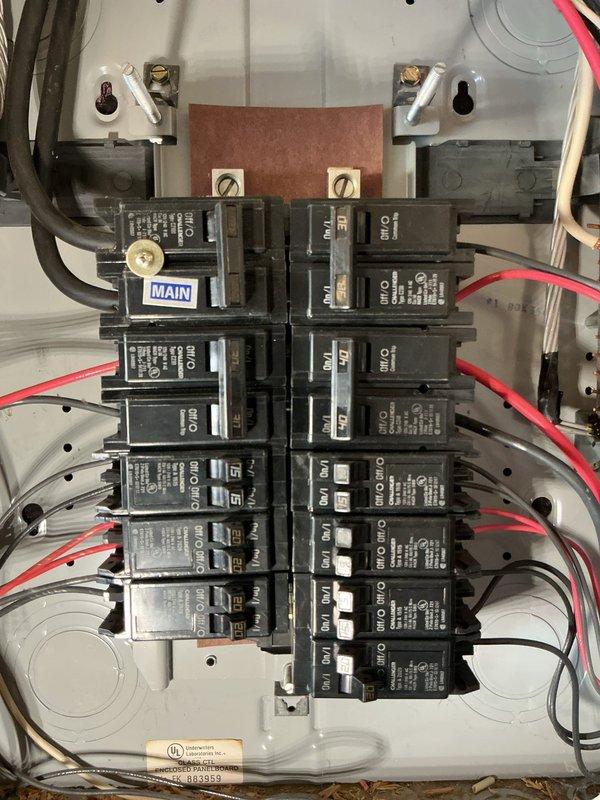 Completed comprehensive electrical inspection of residential property. Evaluated exterior utility meter installation, confirming proper mounting of Ameren Gridstream RF meter in Milbank Type 1R enclosure with secure conduit connections and appropriate weatherproofing. Inspected main electrical panel, verifying circuit breaker configuration, wire routing integrity, proper conductor sizing, and secure terminations at main bus bars, with all components functioning within normal operating parameters.