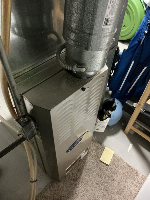 Completed comprehensive cooling tune-up maintenance on two 18-year-old HVAC units servicing the property, including one air handler system located in interior utility space and one rooftop air conditioning unit. Performed standard preventative maintenance procedures on both systems, including inspection of all mechanical components, electrical connections, refrigerant levels, and airflow performance. Inspected and documented condition of 14x20x1 air filter in air handler unit, noting moderate dust accumulation on pleated media consistent with normal operation.