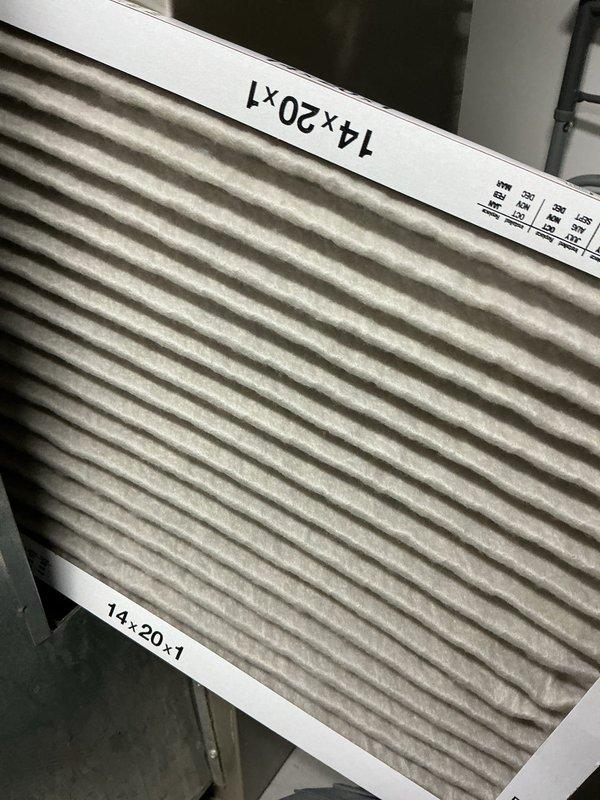 Completed comprehensive cooling tune-up maintenance on two 18-year-old HVAC units servicing the property, including one air handler system located in interior utility space and one rooftop air conditioning unit. Performed standard preventative maintenance procedures on both systems, including inspection of all mechanical components, electrical connections, refrigerant levels, and airflow performance. Inspected and documented condition of 14x20x1 air filter in air handler unit, noting moderate dust accumulation on pleated media consistent with normal operation.