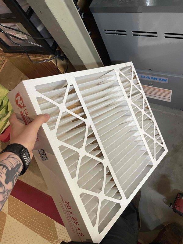 Completed comprehensive cooling system tune-up on 5-year-old outdoor AC unit. Performed full system inspection including blower motor assembly verification, electrical connection assessment, and filter replacement with new 20x25x5 pleated filters. All components found in good operating condition with no deficiencies noted; system operating within manufacturer specifications.