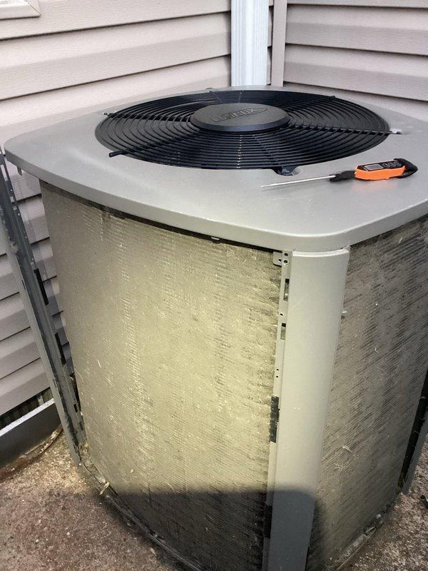 Responded to no cooling complaint on 3-year-old residential air conditioning system. Upon inspection, found outdoor condenser coil heavily contaminated with dirt, dust, and debris accumulation restricting airflow and preventing proper heat transfer. Thoroughly cleaned condenser coil to restore system efficiency and airflow. Unit tested and confirmed operational with proper cooling restored throughout home.