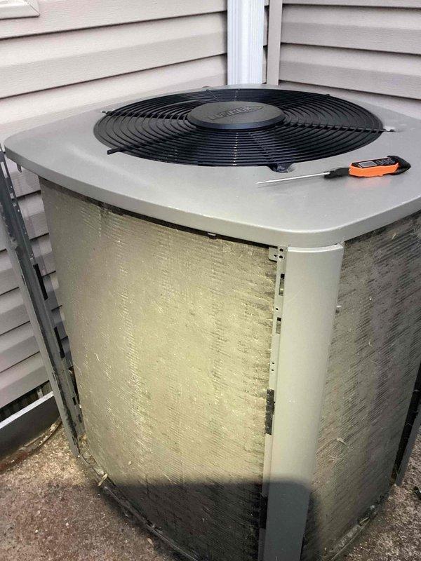 Responded to no cooling complaint on 3-year-old residential air conditioning system. Upon inspection, found outdoor condenser coil heavily contaminated with dirt, dust, and debris accumulation restricting airflow and preventing proper heat transfer. Thoroughly cleaned condenser coil to restore system efficiency and airflow. Unit tested and confirmed operational with proper cooling restored throughout home.