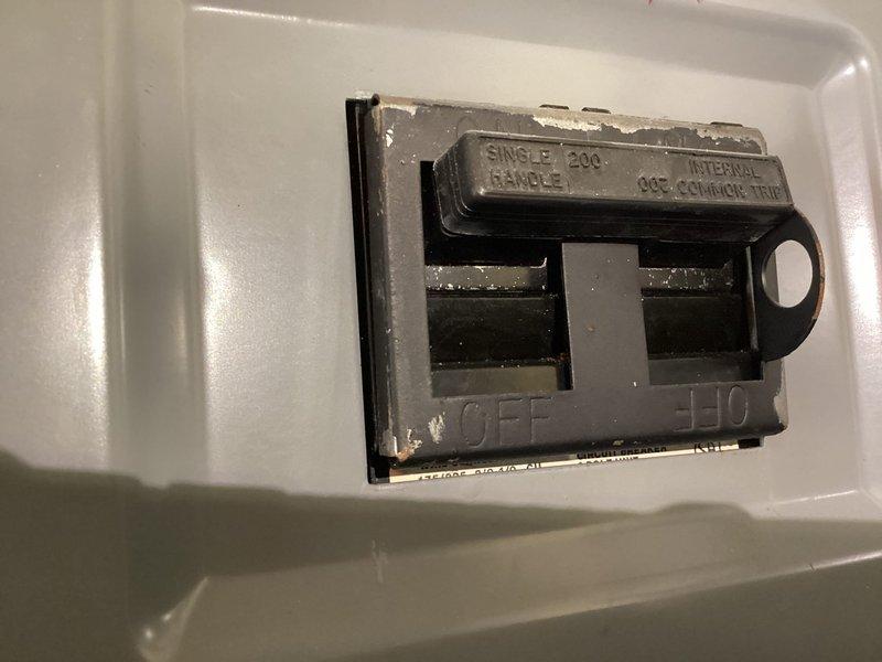 Completed comprehensive electrical home audit and safety inspection of residential electrical system. Documented main electrical panel configuration, including 200-amp single-pole breakers and circuit distribution layout, noting proper QEC common trip functionality and circuit labeling for various home systems including porch, kitchen appliances, microwave, garage, and solar panel system integration. All breaker switches operational with visible amperage ratings confirmed; panel showed normal wear consistent with age but remains in serviceable condition with adequate circuit organization and handwritten circuit identification present.