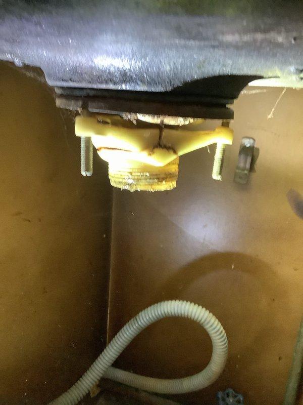 Installed a 40-gallon tall gas water heater with 3/4" pressure reducing valve in compliance with City of Ballwin permit requirements. Connected gas line, water supply, and venting system with proper fittings and supports. Additionally replaced customer-supplied garbage disposal unit and reworked tubular drain assembly under kitchen sink to accommodate new fixture installation.