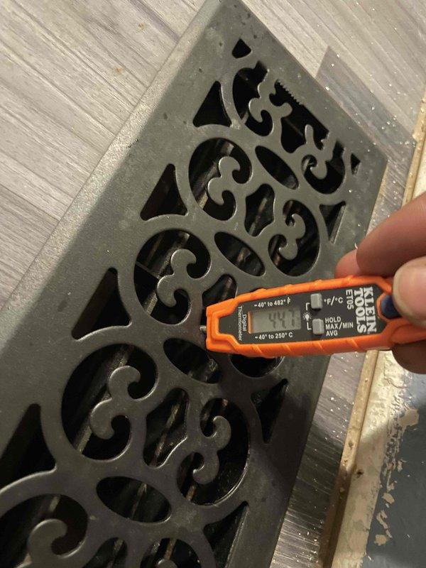 Responded to callback for newly installed air conditioning system reported to be blowing warm air. Arrived after 3:00 PM per customer availability and performed diagnostic testing on backyard unit. Measured supply air temperature at decorative floor register using digital thermometer, confirming system was operating in cooling mode with thermostat set to 70°F. Verified thermostat communication, mode settings, and temperature differential between return and supply air to ensure proper system operation and resolve warm air complaint.