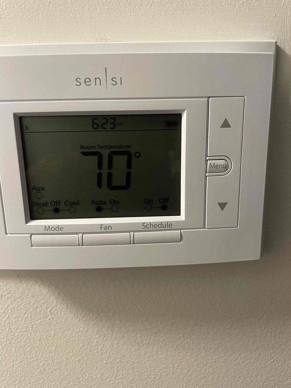 Responded to callback for newly installed air conditioning system reported to be blowing warm air. Arrived after 3:00 PM per customer availability and performed diagnostic testing on backyard unit. Measured supply air temperature at decorative floor register using digital thermometer, confirming system was operating in cooling mode with thermostat set to 70°F. Verified thermostat communication, mode settings, and temperature differential between return and supply air to ensure proper system operation and resolve warm air complaint.