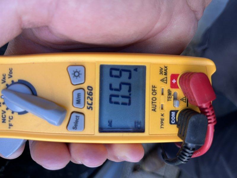 Responded to no cooling complaint on residential split system under 10 years old located in side yard. Upon inspection, found unit blowing warm air as reported. Accessed condensing unit compartment and observed significant debris accumulation including leaves and dirt in base pan. Tested capacitor marked 4545 using Fluke T6-600 electrical tester and confirmed failed dual run capacitor with low microfarad reading of 0.3. Replaced defective capacitor with properly rated unit, verified all electrical connections secure, and tested system operation. Unit now cooling properly with normal amperage draw and temperature split across evaporator coil.