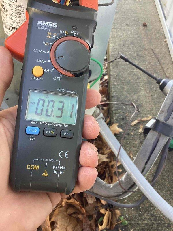 Completed comprehensive cooling system tune-up on 10-year-old AC unit located at side of home. Performed standard maintenance protocol including electrical diagnostics with digital clamp meter, recording amperage draws to verify compressor and condenser fan motor operation within manufacturer specifications. All measurements indicated normal operating parameters, system tested and confirmed operational.