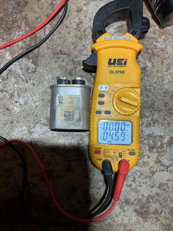 Completed cooling tune-up on 6-year-old outdoor AC unit located in backyard. Performed comprehensive system inspection, noting heavily soiled condenser coils with significant dirt and debris accumulation requiring cleaning for optimal heat transfer efficiency. Tested capacitor using clamp meter, verified electrical readings, and confirmed all system components operating within manufacturer specifications.